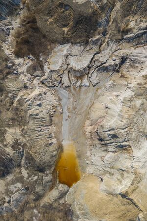 Aerial view of an open mine pit. Exploitation and nature pollutionの写真素材