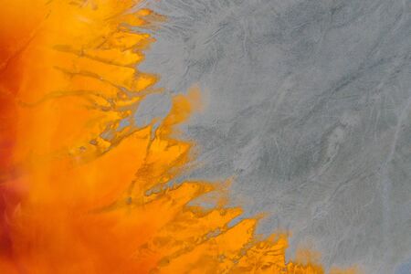 Drone view of contaminated, toxic water stream in Geamana, Romaniaの写真素材
