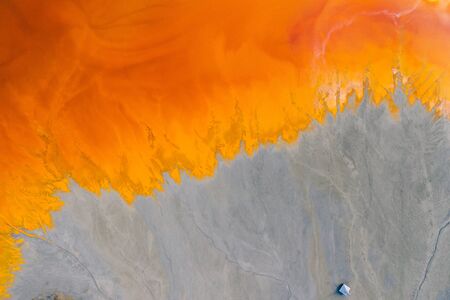 Drone view of contaminated, toxic water stream in Geamana, Romaniaの写真素材