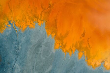 Drone view of contaminated, toxic water stream in Geamana, Romaniaの写真素材