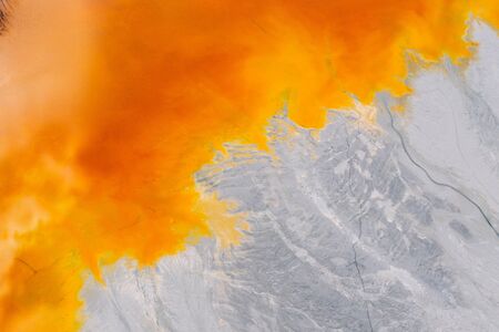 Drone view of contaminated, toxic water stream in Geamana, Romaniaの写真素材