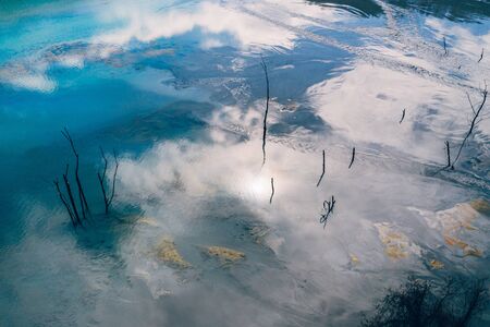 Drone view of contaminated, toxic water stream in Geamana, Romaniaの写真素材