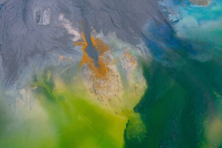 Drone view of contaminated, toxic water stream in Geamana, Romaniaの写真素材