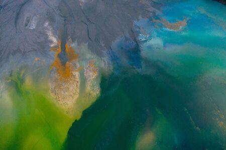 Drone view of contaminated, toxic water stream in Geamana, Romaniaの写真素材