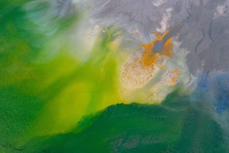 Drone view of contaminated, toxic water stream in Geamana, Romaniaの写真素材