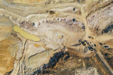 Aerial view of an open mine pit. Exploitation and nature pollutionの写真素材