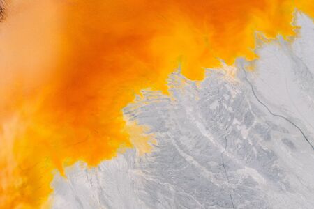 Drone view of contaminated, toxic water stream in Geamana, Romaniaの写真素材