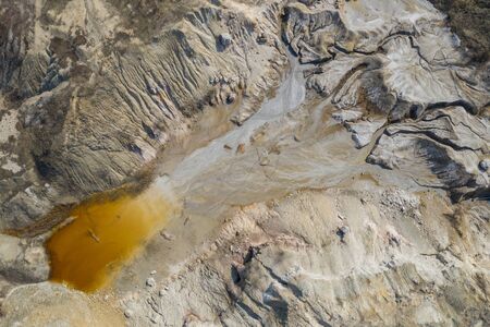 Aerial view of an open mine pit. Exploitation and nature pollutionの写真素材