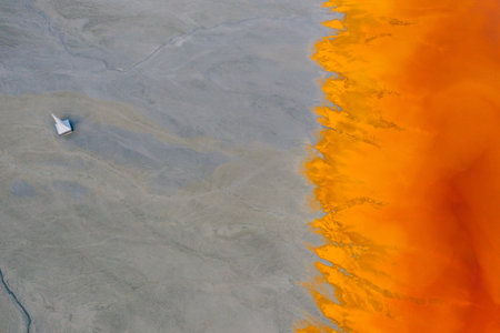 Drone view of contaminated, toxic water stream in Geamana, Romaniaの写真素材