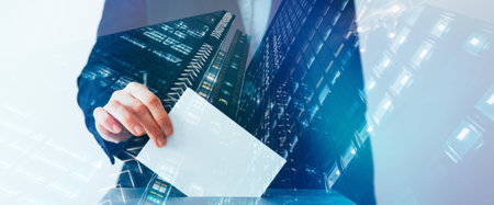 Double exposure image of voter putting ballot into voting box and buildings. Business and election...