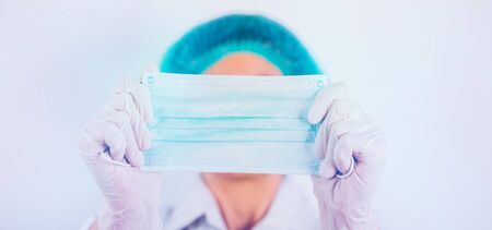 Healthcare and medical image with doctor and protection mask, vaccines an stethoscope. Covid-19 concept.の写真素材
