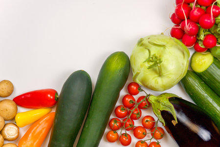 Fresh vegetables on white background. Healthy food concept. Top view.