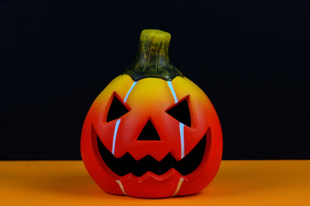 Halloween pumpkin isolated on a black background with copy space for textの写真素材