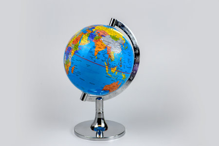 Globe on a stand on a white background. Isolated.の写真素材