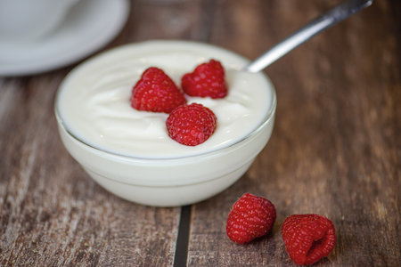 Greek yogurt with raspberries, healthy breakfastの写真素材