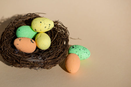 Colored Easter Eggs In Nest With Space For Text, Easter Background. High quality photo