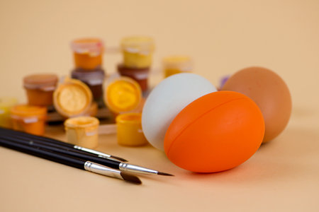 Easter eggs with paints and brushes. High quality photoの写真素材