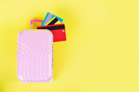 A stylish and trendy pink suitcase, ideal for both travel and exciting adventuresの写真素材
