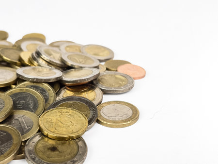 euro cents close-up on a white background, isolate. Business Finance Concept. High quality photoの写真素材