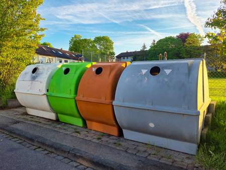 Caring about an environment, separating garbage into different containers. High quality photoの写真素材