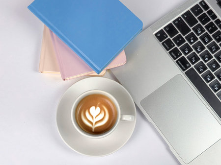 A delightful combination of rich coffee, interesting books, and a trusty laptop, perfect for...