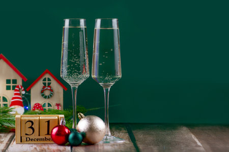 Champagnefilled glasses, lovely ornaments, and a festive countdown for an exciting New Years Eve celebrationの写真素材
