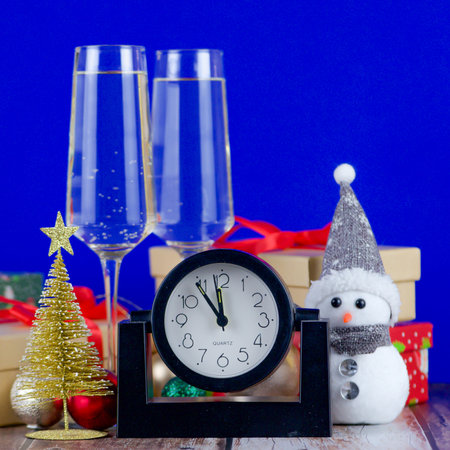 Celebrate New Years Eve with elegant decor, and a clock counting down to magical midnightの写真素材