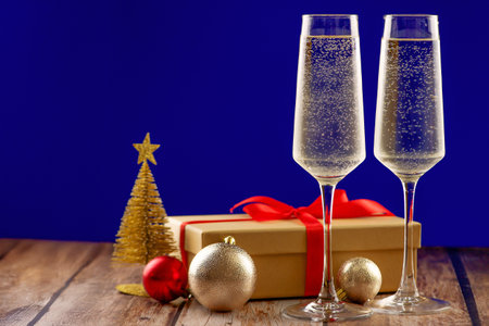 Join us for a festive celebration with delightful Champagne and beautiful Christmas decorの写真素材