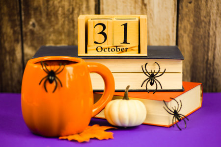 A wooden calendar for October 31st filled with vibrant fall colors and delightful seasonal props....