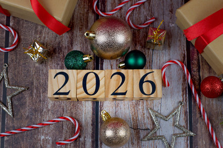 Festively decorated New Year 2026 displays feature gifts, vibrant ornaments, and a warm holiday...