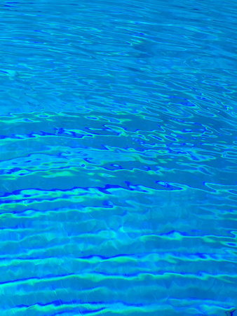 A serene view of clear blue water with gentle ripples, perfect for tranquility and relaxation...
