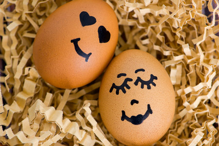 Adorably Cute Decorated Eggs featuring Smileys cleverly placed on Shredded Paper