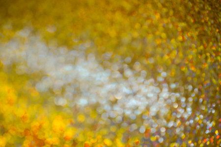 A Beautiful and Glittering Abstract Background Showcasing Stunning Golden Bokeh Effects