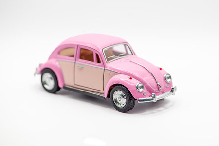 Metallic warm pink restored vintage car. High quality photoの写真素材