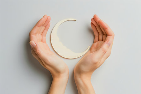 Embryo between two palms on white isolated background. In vitro fertilization. Concept. High quality photoの素材