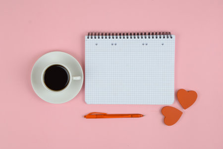 Cup of coffee with hearts on color background. High quality photoの写真素材