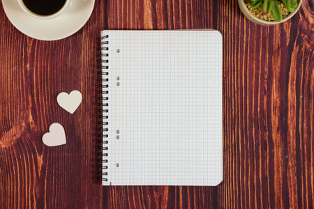 White notebook and paper hearts. Love, romantic, Valentine's day concept. High quality photoの写真素材