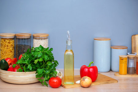 Healthy Kitchen Ingredients Arranged Professionally, Vibrant Assortment Of Fresh Produce And Condiments Ready For Cookingの写真素材