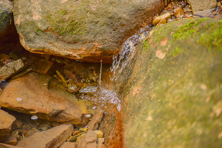 Moss Covered Rocks With Trickling Stream, Shallow Pool With Scattered Pebbles, Green Lichen, Soft...