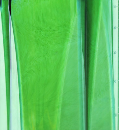 Healthy smoothie for weight loss. Blending ingredients for  smoothie clouseup. Ingredients such as: spinach, celery, wheat germ, apple.の写真素材