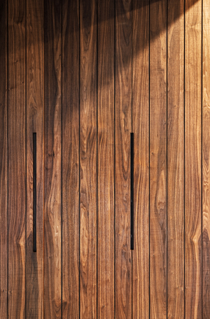 Brown wooden wall, background. Wooden texture, surface. Wooden pattern.の写真素材