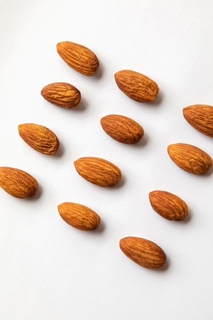 Almond on white background. Top view.の写真素材