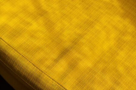 Pattern yellow textile sofa texture background.の写真素材
