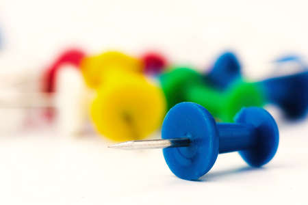 Set of push pins in different colors, with real shadows, isolated on white background - macroの写真素材