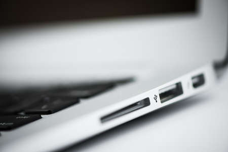 Laptop isolated on white background - macro wallpapersの写真素材