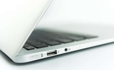 Laptop isolated on white background - macro wallpapersの写真素材