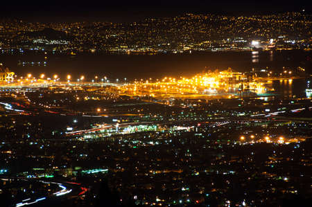 The beautiful lights shining off the San Francisco bay at night.の写真素材