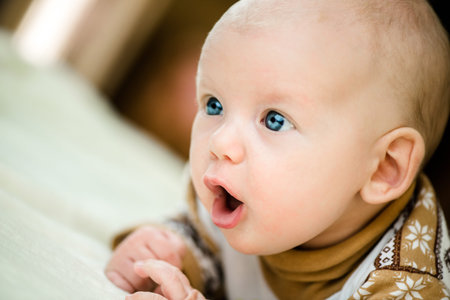 cute little baby girl with amazement on her face