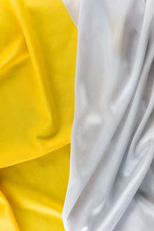 Yellow and White fabric texture backgroundの写真素材