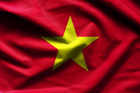Waving flag of Vietnam. Flag has real fabric texture.の写真素材